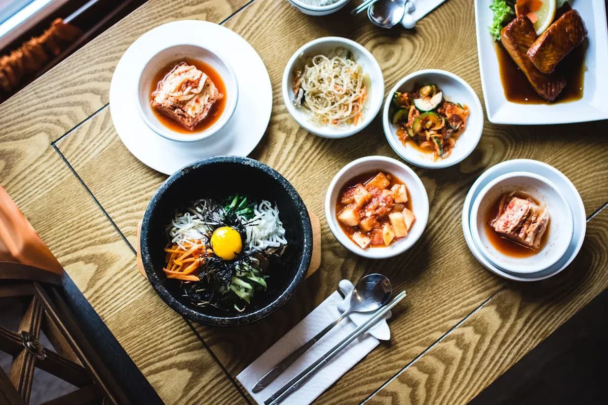 Restaurant table with shared dishes ready for QR menu ordering